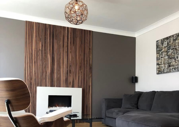 wood slat panel accent wall Pakistani TV lounge bedroom 2026